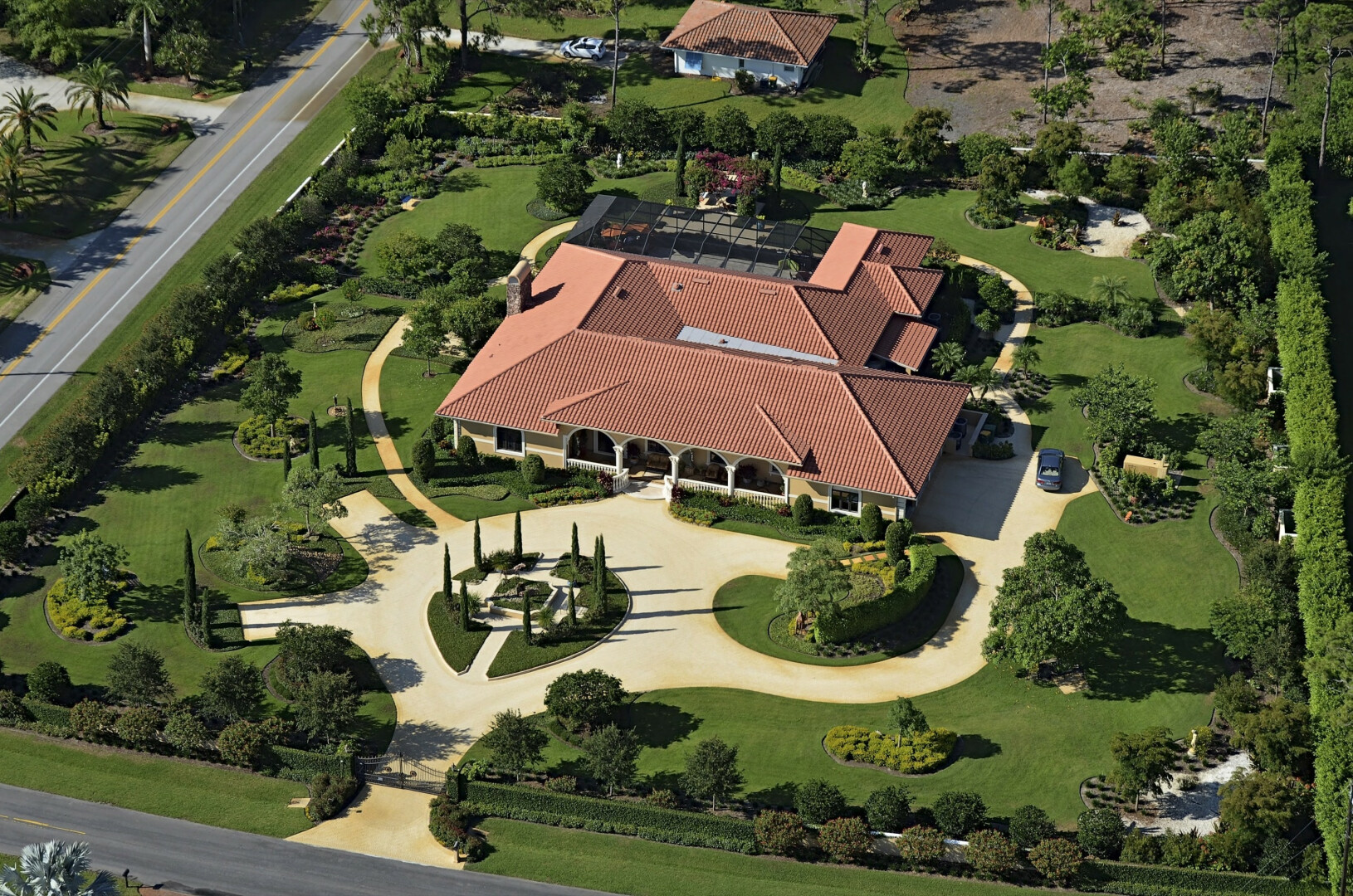 Aerial view of luxury custom Mediterranean style estate, Naples FL