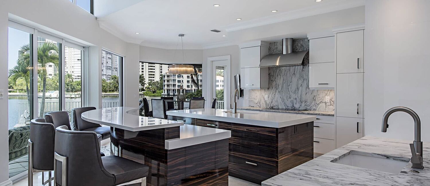Kitchen remodel with top-of-the line marble counters, backsplash, and island, Naples FL