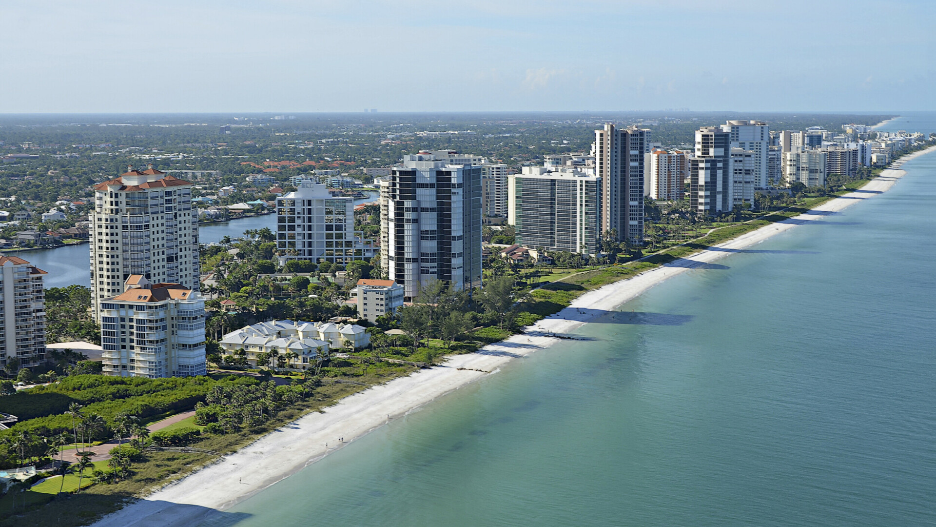 Aerial view of luxury beach condos on the Gulf, Naples FL