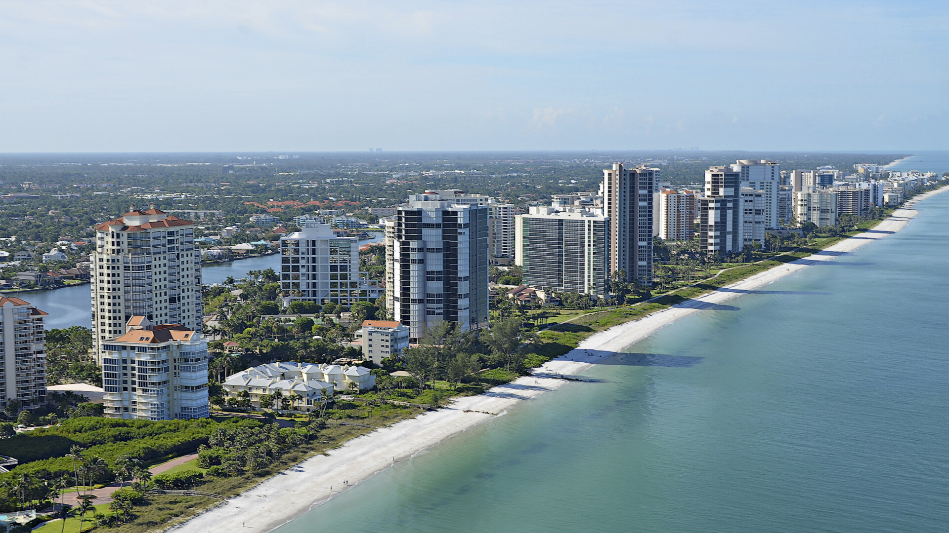 Aerial view of luxury beach condos on the Gulf, Naples FL