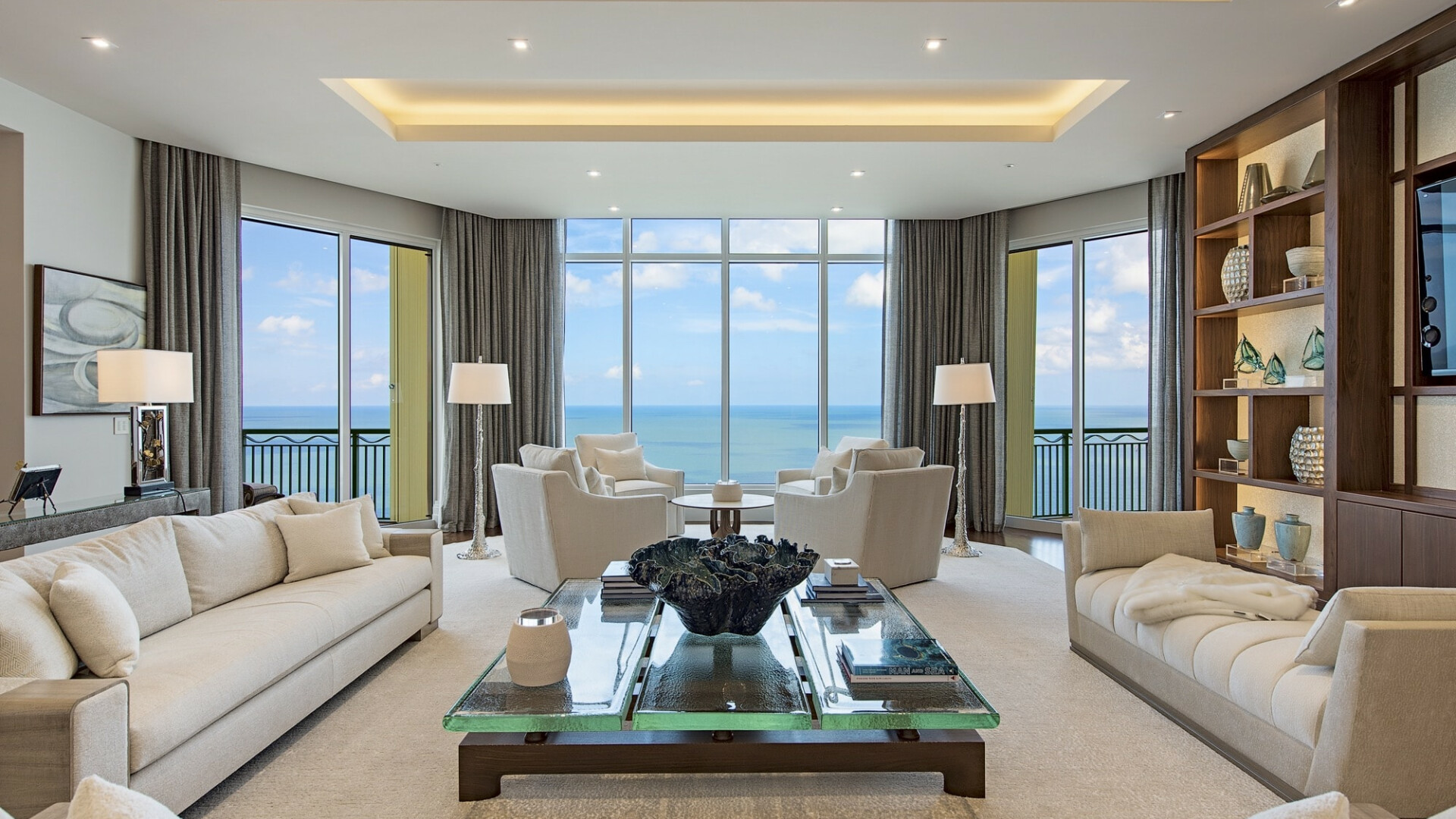 Luxury living room with bay windows overlooking the water, Naples FL