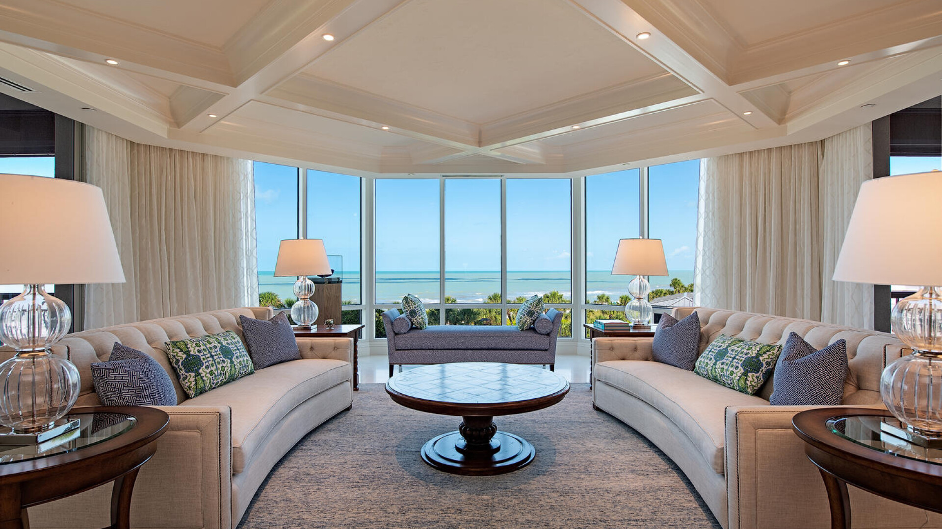 Modern living room with amazing ceiling detail and views of the water, Naples FL